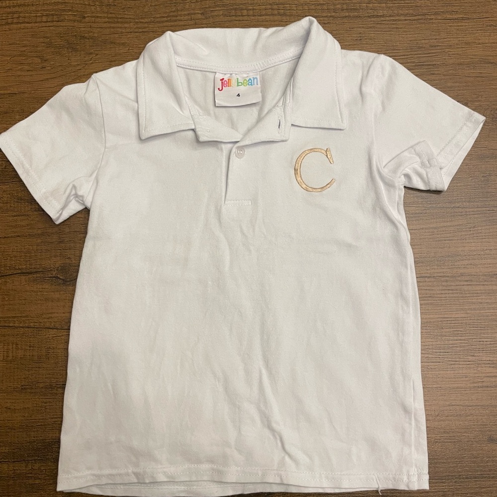 Jelly Bean White Polo Shirt with khaki embroidered “C”